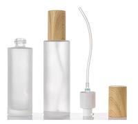 2 Pcs 100ml 3.4oz Glass Travel Pump Bottles with Plastic Wood Grain Lids Refillable Leakproof Cosmetic Containers for Shampoo Lotion Essential Oil Toiletries Cream Dispenser