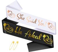 2 Pcs “SHE SAID YES” Bride to Be Sash & “He Asked” Groom to Be Sash Set, Funny Bachelorette & Bachelor Sash for Bridal Shower Hen Party Accessories Wedding Engagement Party Decorations (Black, White)