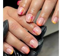 24Pcs Nude Round Fake Nails with Accessory Tools Featuring Orange French Tips and Multi-Color Dot Details, Chic and Playful Press on Nail Set with a Glossy Finish and Soft Art Touch