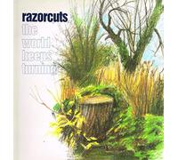 Razorcuts - 5017556300459 LP The World Keeps Turning VINYL