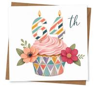64th Birthday Card for Her, Pink Cupcake & Striped Candles | Charming 64th for her with soft pink icing, striped number candles, and colourful flowers beside the cupcake.