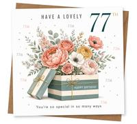 77th Birthday Card for Her, Floral Gift Box & Confetti | Cheerful confetti dots with a floral gift-box design and the front message "Have a lovely 77th" for her birthday.