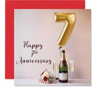 7th Anniversary Card - Gold 7 Balloon and Champagne Toast | Blush Pink Background, Burgundy Lettering and a Small Bouquet Beside the Flutes, 145mm Square, Envelope Included