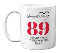 89th Birthday Gifts for Women Men, Cheeky Novelty Mug Young at Heart, Gag Joke Gifts, Perfect Funny Mugs for Eighty-Nine Eighty-Ninth Birthday Present, 11oz Ceramic Coffee Mugs