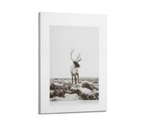 A Canvas Featuring A Reindeer with Large Antlers Standing in A Snowy Field with Brown Patches of Grass Poster Decorative Painting Canvas Wall Posters And Art Picture Print Modern Family Bedroom Decor