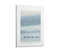 A Canvas Showing A Herd of Four Reindeer Walking Across A Vast Snow-covered Landscape with Frosty Trees Poster Decorative Painting Canvas Wall Posters And Art Picture Print Modern Family Bedroom Decor