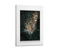 A Canvas Showing A Leopard with Striking Blue Eyes Peeking from behind Dark Green Foliage Poster Decorative Painting Canvas Wall Posters And Art Picture Print Modern Family Bedroom Decor Posters 12x18