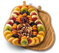 A Gift Inside Festive Dried Fruit and Nuts on Bamboo Pear Shaped Cutting Board