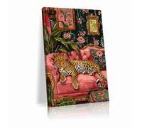 A leopard-print wall art poster on a pink sofa, a plant-themed wall art piece, a maximalist decorative style, and a living room home decor wall art piece.(L24 xW16-Framed)