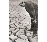 A man standing in the reservoir at Kettering Northamptonshire surveying its sun-baked bottom following the summer's drought of 1934. From These Tremendous Years published 1938. Poster Print by Ken