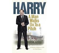 A Man Walks On To a Pitch