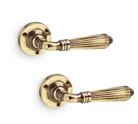 AB Hardware Aged Solid Brass Regency Style Sprung Door Handles Vintage Reeded Rose Lever