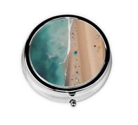 Aerial View of The Beach A Round Mini Pillbox with Three Compartments for Storing Vitamins, Fish Oil, and Nutritional Supplements.