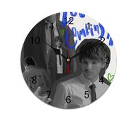 AFLJNYNN Louis tomlinson Modern minimalist PVC wall clock with quiet operation, frameless style, and lightweight design perfect for multiple interior decoration uses.