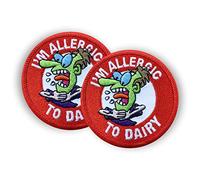 Al’s Allergy Alert Patches, Pin Badges & Stickers - Allergic to Dairy - The Designs are Fun and Bright but get The Important Message of Food Allergy Across. (No Dairy - Sew-on Badges x 2)
