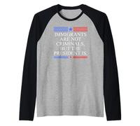 America US Immigrants are Not Criminals But The President is Raglan Baseball Tee