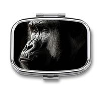 an Adult Gorilla Pill Box 2 Compartment, Portable Pill Case with Mirror for Pocket Purse Travel, Mini Metal Medicine Organizer for Vitamins Fish Oil
