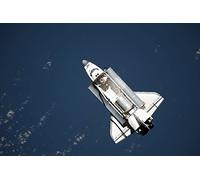 April 7, 2010 - Aerial view of the space shuttle discovery over Earth as it approaches the international space station Leonardo Multi-Purpose Logistics Module is visible on Discovery Cargo Bay Poster