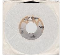 back in love again / material things 45 rpm single