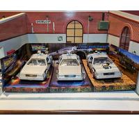 Back to the Future Delorean SET OF 3 Trilogy DMC 1:24 Scale Model Cars BNIB