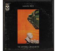 battered ornaments - mantle piece