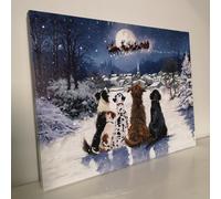 Battery Operated Fibre Optic 40x30cm Christmas Dogs Watching Santa Fly Over Village Canvas