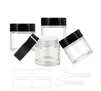 BEGIKET 4 Pack 2 oz Clear Glass Cream Jar，60ml Empty Round Glass Jar with Inner Liners and Black Lid,Cosmetic Containers for Storing Cream,Ointments,Lotion(Clear - Black Lid)
