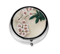 Bell Orchid This Small, Round Pill Box is a Portable Travel Medicine Organizer with Three compartments for Storing Daily medications.