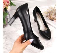 Black pumps on the W Sergio Leone post