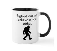 CafePress Bigfoot Doesn't Believe in You Either Mugs 11 oz (325 ml) Ceramic Coffee Mug