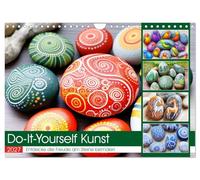 Calendar 2027 · US Version · Do-It-Yourself Art - Discover the joy of | painting stones · A rush of colors on stones · Creative motifs for the whole… · 12" × 8" Landscape · CALVENDO Wall Calendar