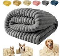 Calming Blanket for Dogs: A soft, ribbed plush throw designed specifically for pets. Suitable for use on sofas, dog beds, human beds, and travel carriers. Machine washable.