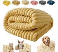 Calming Blanket for Dogs: A soft, ribbed plush throw designed specifically for pets. Suitable for use on sofas, dog beds, human beds, and travel carriers. Machine washable.