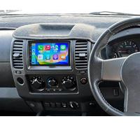 Car Stereo Radio Compatible for Nissan Navara 2.5 D-iesel 190 bhp 2012 with Carplay Android Auto GPS Navigation 7in Touchscreen Car Radio Player with Bluetooth FM/RDS SWC Split Screen + Backup Camera