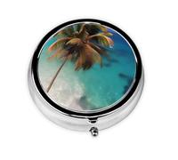 Caribbean Islands A Round Mini Pillbox with Three Compartments for Storing Vitamins, Fish Oil, and Nutritional Supplements.