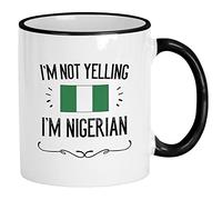 Casitika Funny Nigeria Flag Mug. I'm Not Yelling I'm Nigerian Coffee Cup. Gift Idea for Proud Men and Women Featuring the Country Flag. (11 oz Black Handle/Rim)