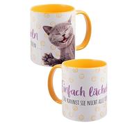 Cat Coffee Mug with German Text "Einfach Lächeln Du kannst sie nicht alle töten" (German Language) Ceramic Yellow / White 320 ml