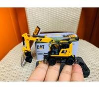 Caterpillar Diecast Masters 85612 - Pelle mobile M323F + accessoires, en boîte métallique, échelle 1:87, env. 9,5 x 3,4 x 4,6 cm, 14+, pour modélisme ferroviaire et collectionneurs