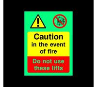 Caution in the event of fire do not use these lifts Safety sign - 1.2mm Photoluminescent glow in the dark rigid plastic with self adhesive backing 200mm x 150mm