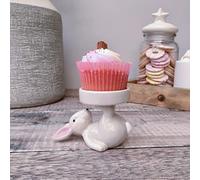 Ceramic Candle/Cake Holder Held By Rabbit | Ceramic Animal Decoration | Grey Rabbit Laying On Back Holding Up Holder By Its Feet