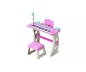 Chad Valley Keyboard Stand and Stool - Pink * Set includes everything your child needs to role play as a pop megastar, including a keyboard - attached to an adjustable stand - and a stool *