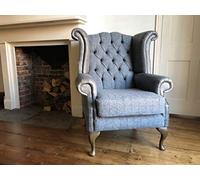 Chesterfield Queen Anne high back wing chair presented in vintage grey leather and grey Harris tweed