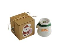 Christmas candles, winter Santa Claus as a burning decoration, scented candle for Christmas holidays, winter evening, parties and celebrations