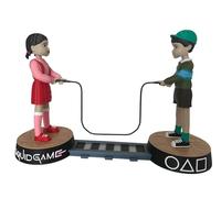Collectible figure inspired by 'The Squid Game'. Two young hee and Chul su children with rope on a bridge base. Made in Spain. Ideal for collectors and fans of the series.