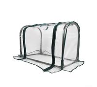 Compact Indoor Greenhouse for Balcony For Gardening Using PVC Construction to Support Plant Humidity Requirements