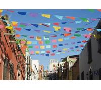 CORFOTO Fabric 5.2x3m Mexican Street Papel Picado Backdrop Colorful Cut Paper Banners Over Colonial Alley Photography Background for Latin Culture Themed Party Photo Props
