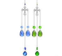 Cross Gemstone Set With Intricate Silver-Toned Metalwork And Light-Refraction Capabilities For Window Areas