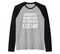 Currently Haunted by Yesterday's Leg Day. Raglan Baseball Tee