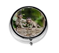 Cute Little Monkeys This Small, Round Pill Box is a Portable Travel Medicine Organizer with Three compartments for Storing Daily medications.