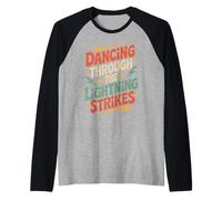 Dancing Through The Lightning Strikes Raglan Baseball Tee